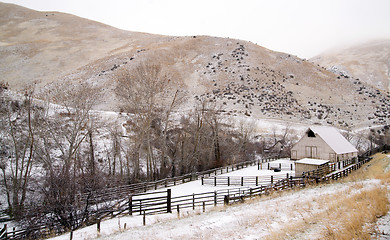 Image showing Fresh Snow Blankets Hillside Rural Country Scene Forgotten Ranch