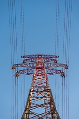 Image showing Large transmission towers at sunset