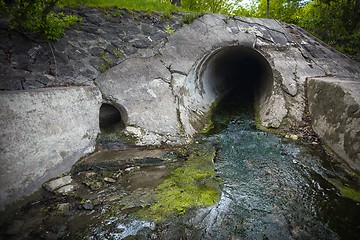 Image showing Cooling water flowing into the river