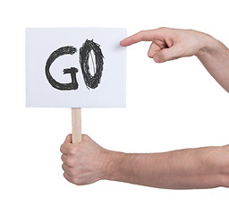 Image showing Hand holding sign, isolated on white