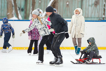 Image showing Family run with a sledge