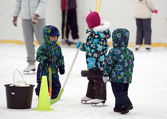 Image showing Three hockey players