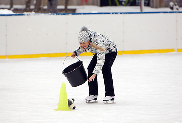 Image showing Get the toys into the bucket