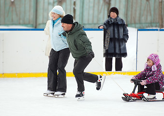 Image showing Family run with a sledge