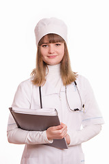 Image showing Medical Officer in the form of working with documents in hand