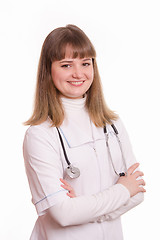 Image showing Girl in white coat with stethoscope