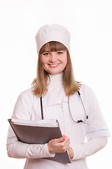 Image showing Health worker in uniform with documents in hand
