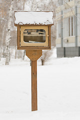 Image showing A small library with free books on the street in the form of house