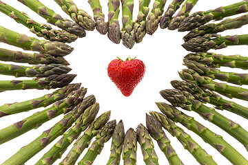 Image showing Strawberry Amidst A Heart Made Of Asparagus Spears