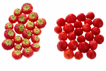 Image showing Strawberries Arranged In Two Groups Over White
