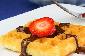 Image showing Waffle with strawberry and chocolate sauce