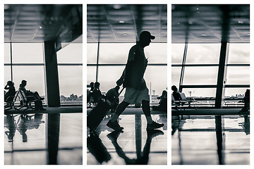 Image showing Silhouette of man at the airport with luggage
