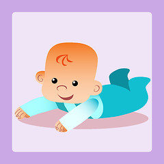 Image showing Happy baby is lying on his stomach trying to crawl