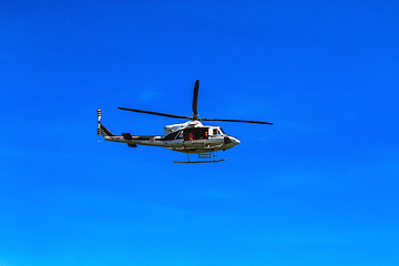 Image showing Helicopter flying