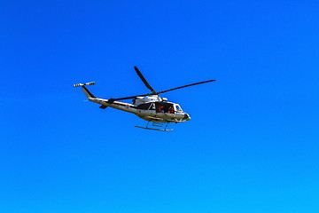 Image showing Helicopter flying