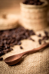 Image showing pile of fresh and bio aromatic coffee beans and spoon