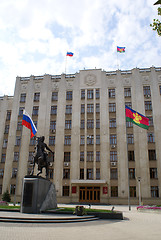 Image showing Man horseback and building