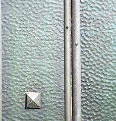 Image showing   varese   abstract    r in a  door curch  closed wood  