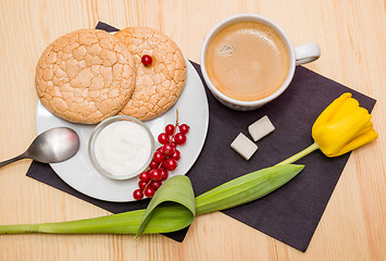 Image showing Cup of coffee and biscuits