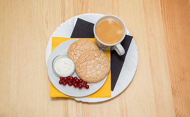 Image showing Cup of coffee and biscuits
