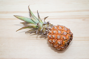 Image showing fresh pineapple on the wooden table