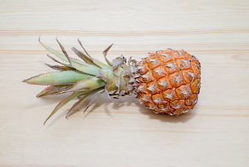 Image showing fresh pineapple on the wooden table