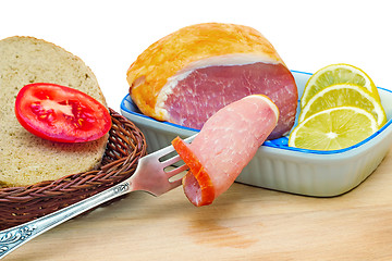 Image showing Ham , bread and vegetables on a white background.