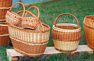 Image showing Wicker baskets for sale at the fair.