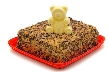 Image showing Delicious cake on a platter, on a white background.