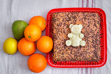 Image showing Delicious cake on a platter and fruit.