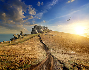 Image showing Sunset and rocks