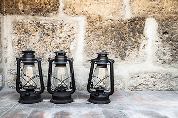 Image showing Three old lanterns in Santa Catalina monastery