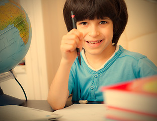 Image showing schoolboy doing homework