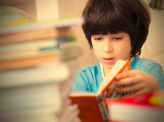 Image showing boy reading a book