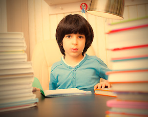 Image showing boy reading a book