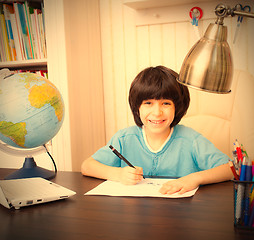 Image showing schoolboy doing homework