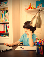 Image showing child doing homework