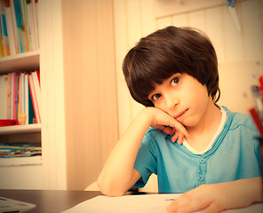 Image showing schoolboy doing homework