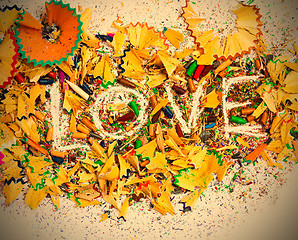 Image showing The word Love on colored pencil shavings