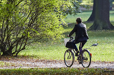 Image showing woman on bike 