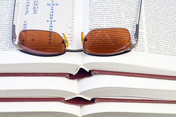 Image showing Glasses on Books