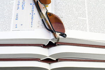 Image showing Glasses on Books