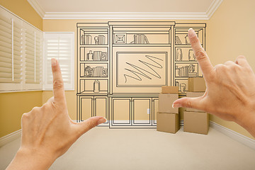 Image showing Framing Hands In Empty Room with Shelf Drawing on Wall