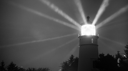 Image showing Lighthouse Beams From Lens Rainy Night Pillars of Light