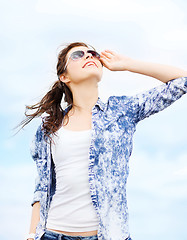 Image showing teenage girl in shades outside