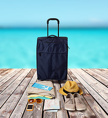 Image showing travel bag and personal stuff for vacation