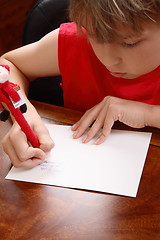 Image showing Child writing a letter