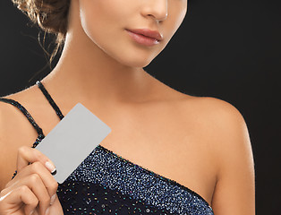 Image showing woman in evening dress with plastic card