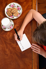 Image showing Child writing a letter