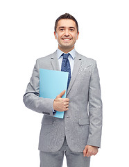 Image showing happy businessman holding folder